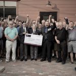 Scugog Historical Society receiving cheque from 100 Men of Scugog